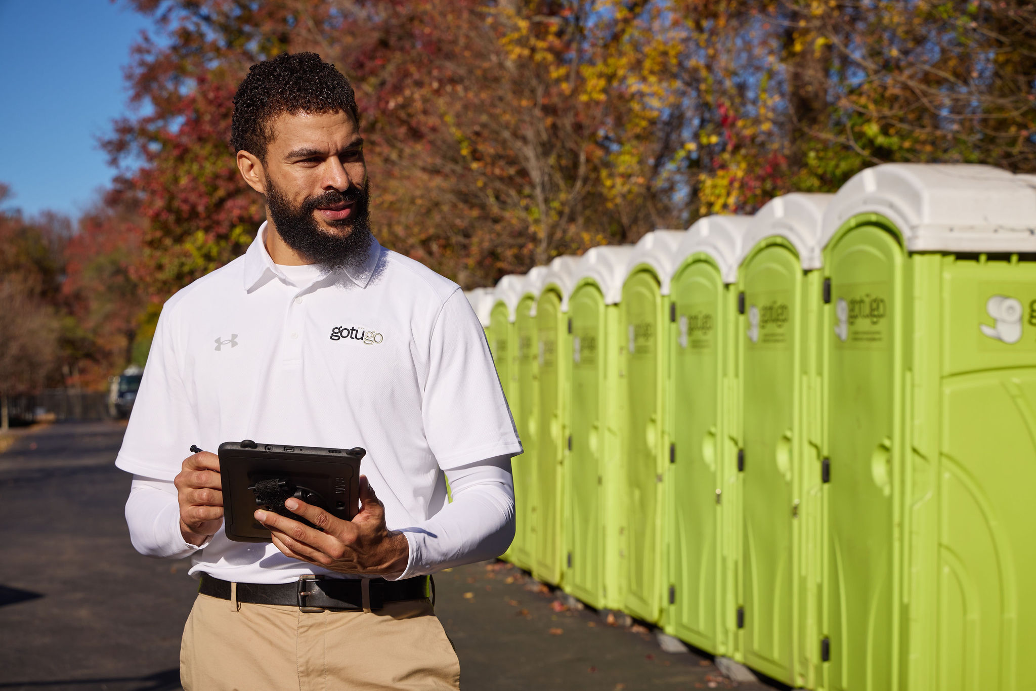 Gotugo employee with a tablet