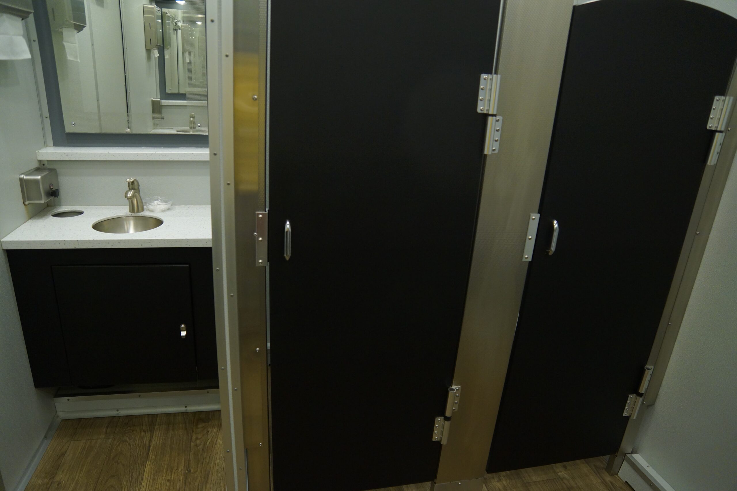 24-Foot Restroom Trailer stalls and sink