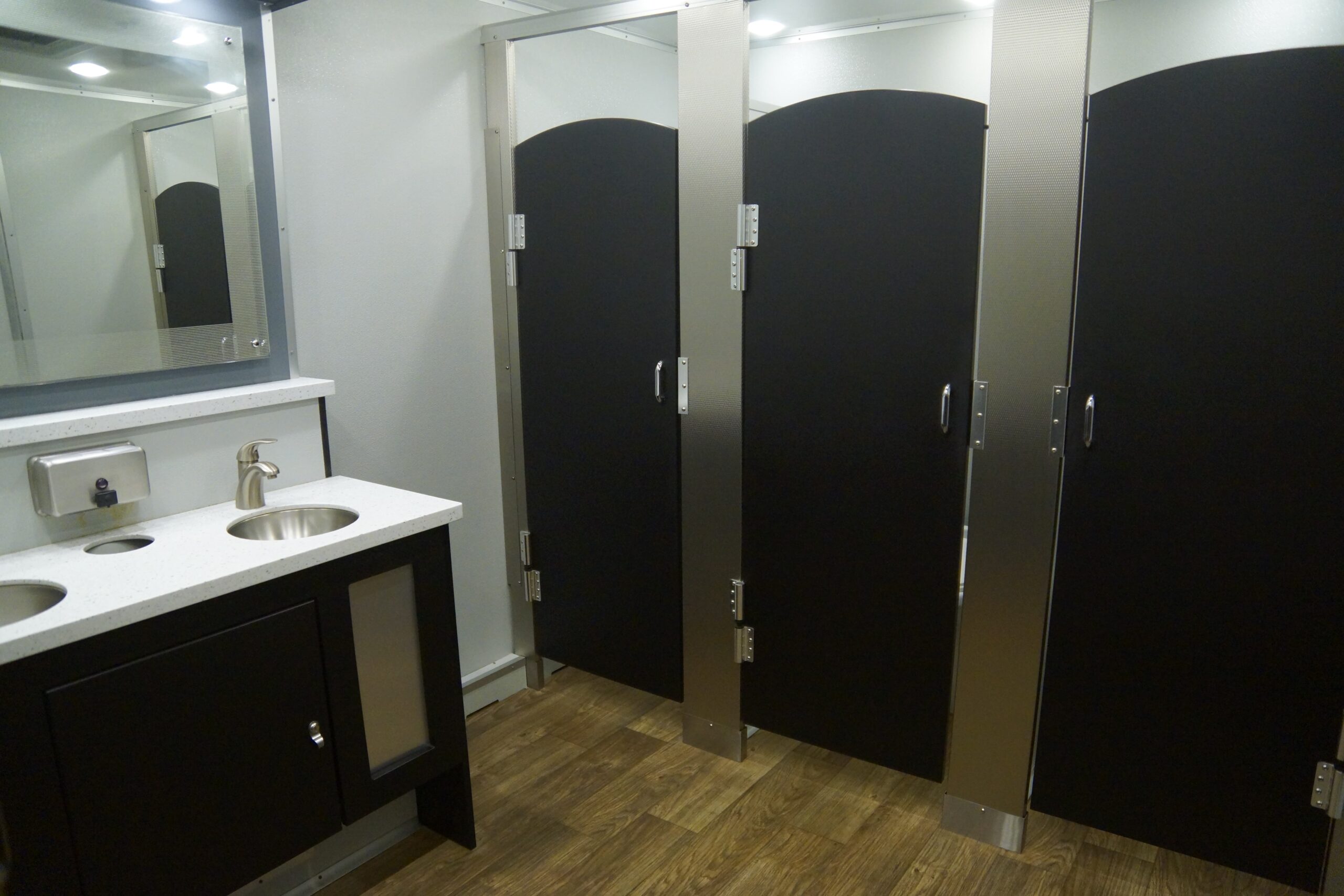 24-Foot Restroom Trailer stalls and sink